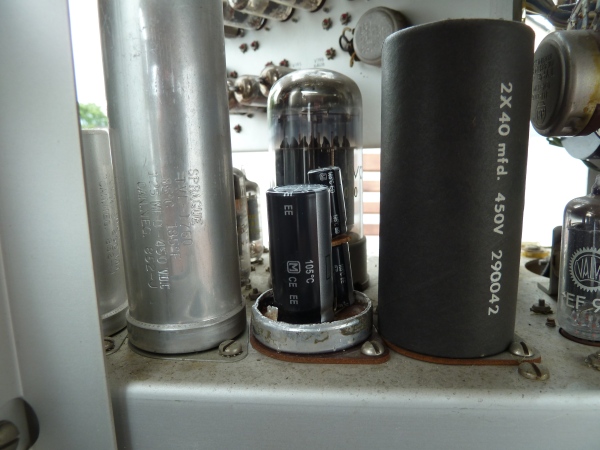 three new caps
sitting on the socket of the original cap